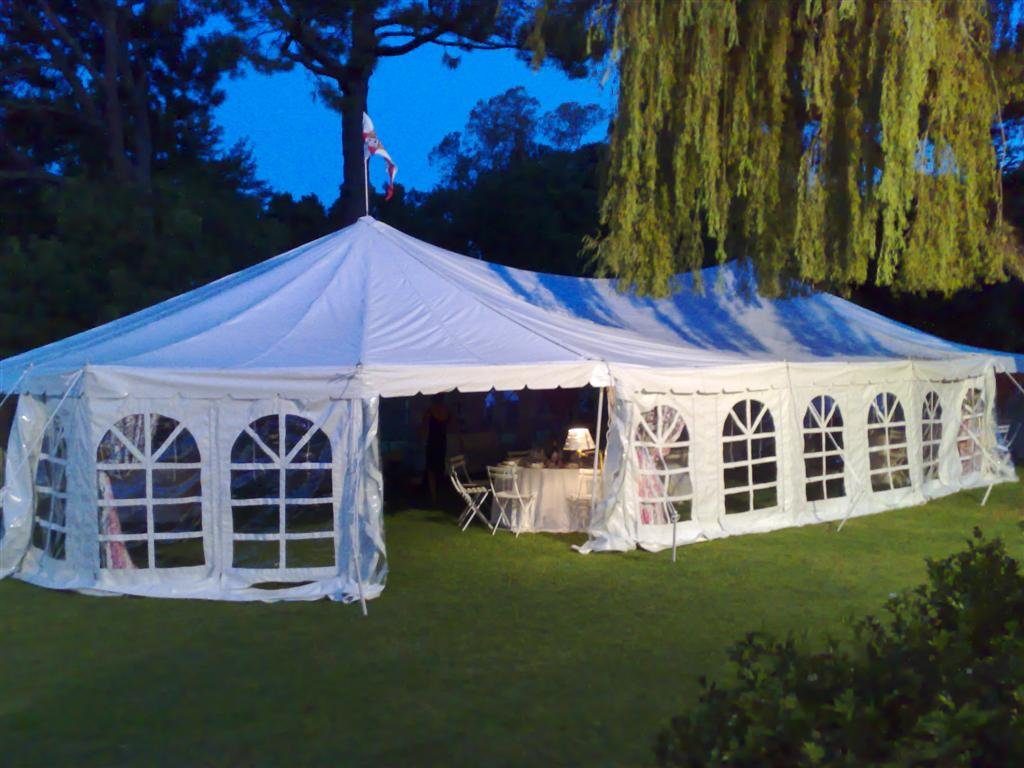 Beautiful white peg and pole marquee tent with windows