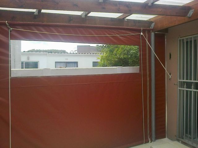 burgundy PVC outdoor blind with window