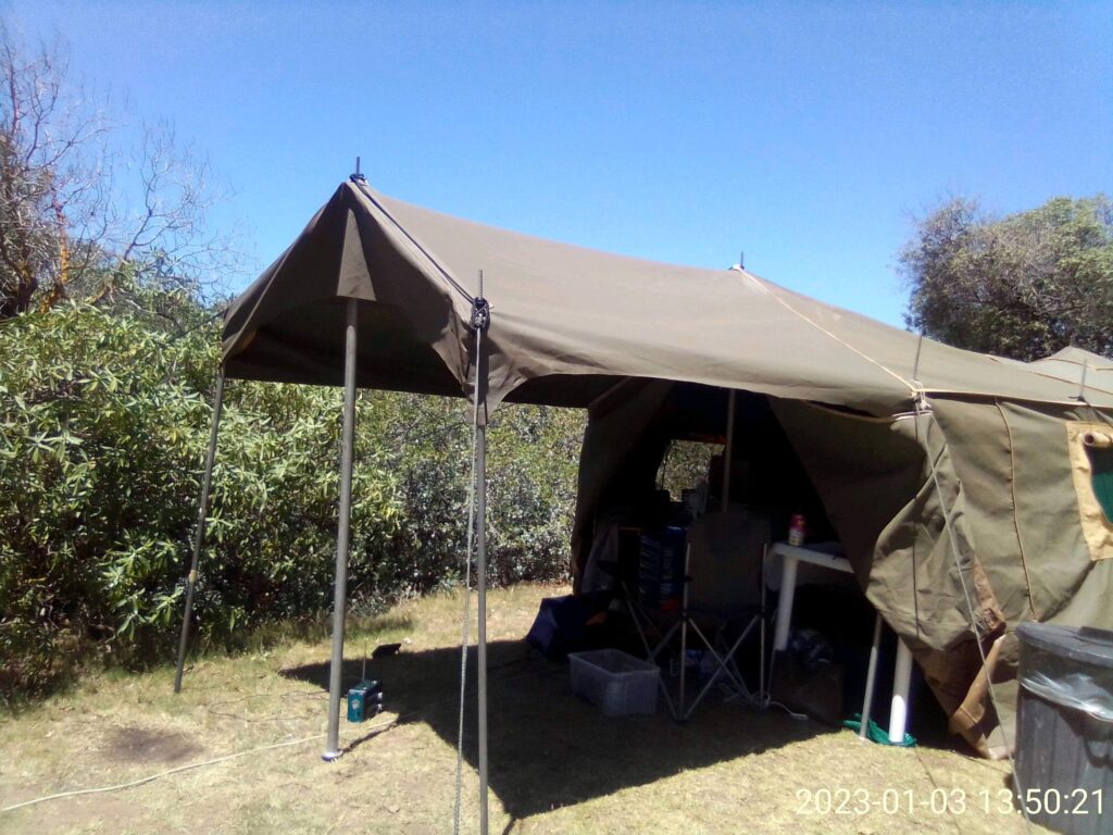 Camping tent with awning